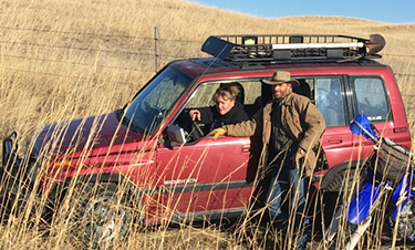 Derek and Lesa Schwanebeck discuss the day's plan at Cornerstone Grazing in the Nebraska Sandhills